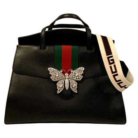 gucci black bag with butterflies|Gucci handbag with butterfly.